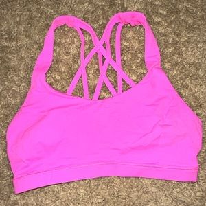 Neon pink Lululemon energy bra. Good condition. Doesn’t come with bra pads.